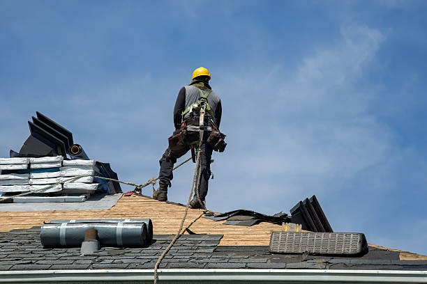 Professional Roofing technician working in Montara, CA